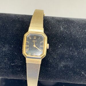 Seiko Women's Gold Tone Watch Black Face Roman Numerals. Working w/ new battery